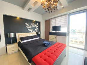 Palm Tree Villas Condotel across NAIA Terminal 3 near Newport Mall